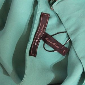 BCBGMaxAzria Pants - BCBG Maxazria Green One Shoulder Jumpsuit Size 6 BCBGMaxAzria Pants - BCBG Maxazria Green One Shoulder Jumpsuit Size 6